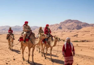 Read more about the article A Journey Across the Golden Sands: The Soul of a Camel Safari and Bedouin Experience